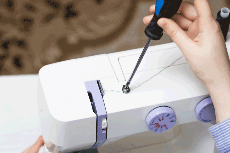how to change tension on sewing machine