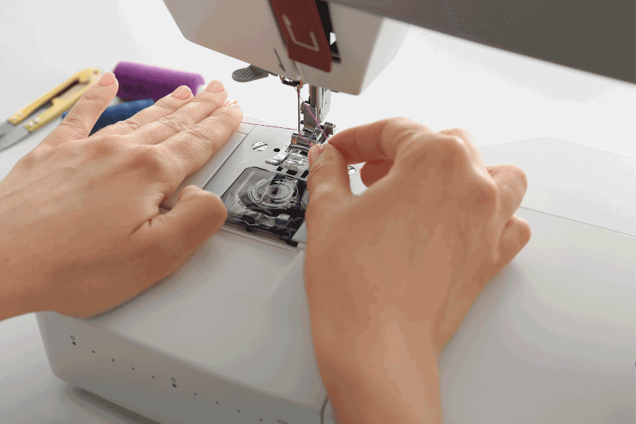 how to put thread in needle sewing machine