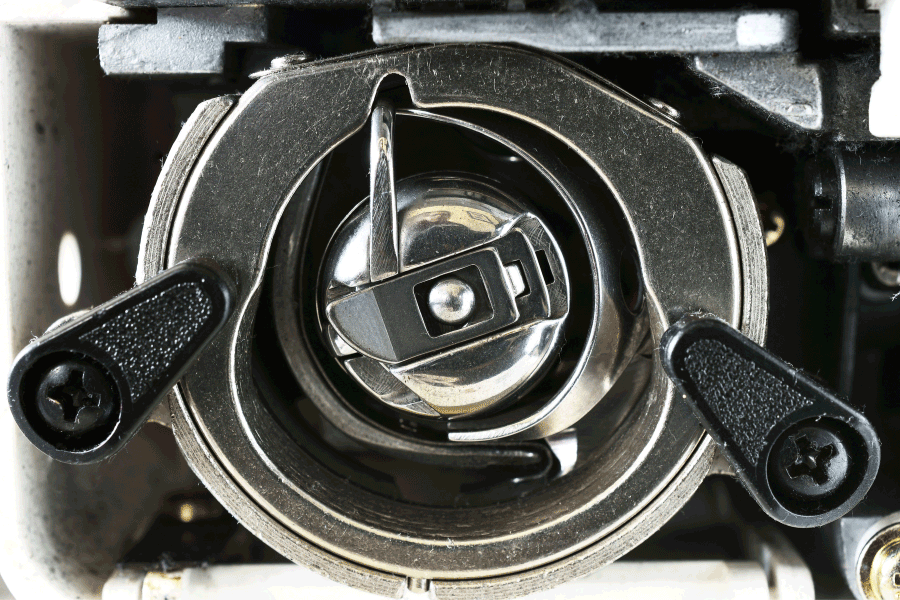 needle hitting bobbin case holder