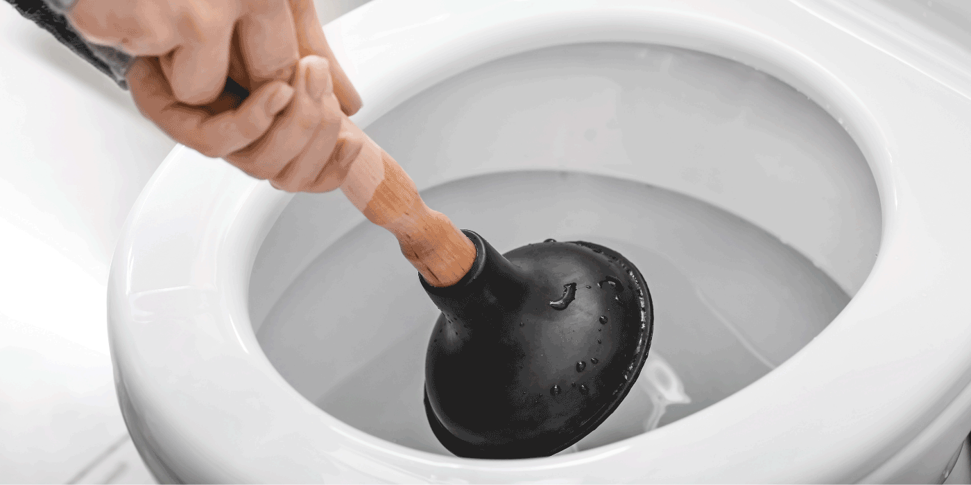 how do you unclog a one piece toilet