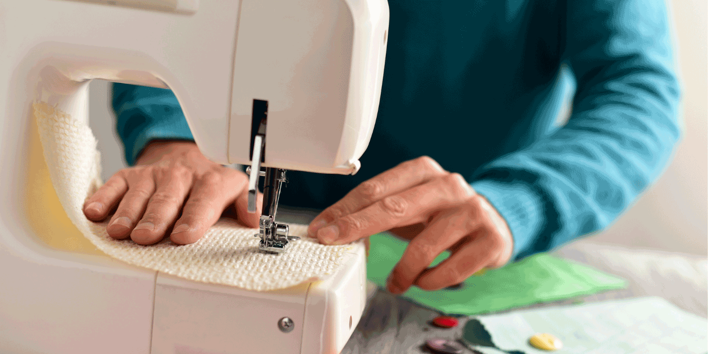 how do you change the stitch length on a singer sewing machine