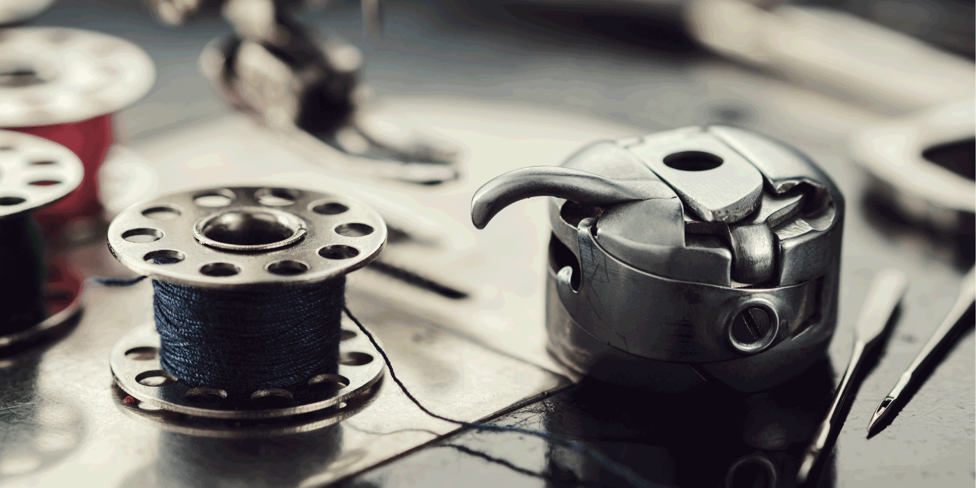 how do you put the bobbin case back in a singer heavy duty sewing machine