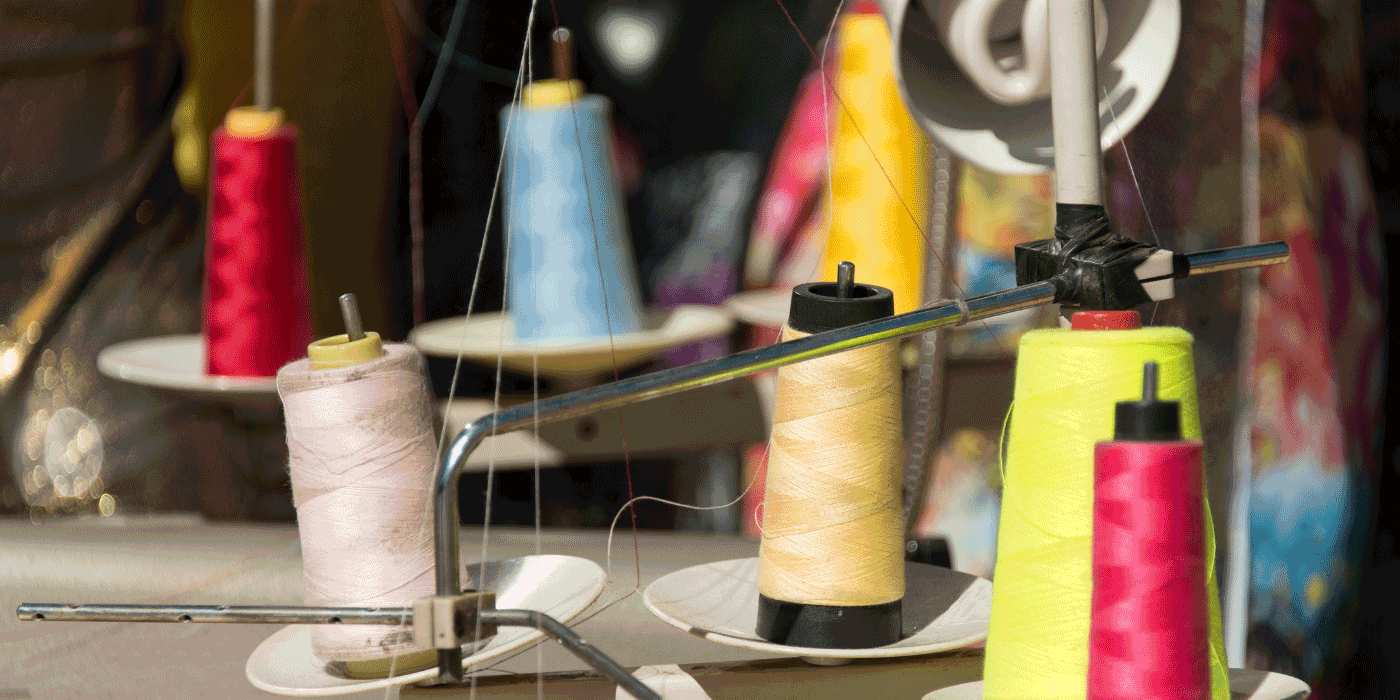 how do you thread a spool on a sewing machine