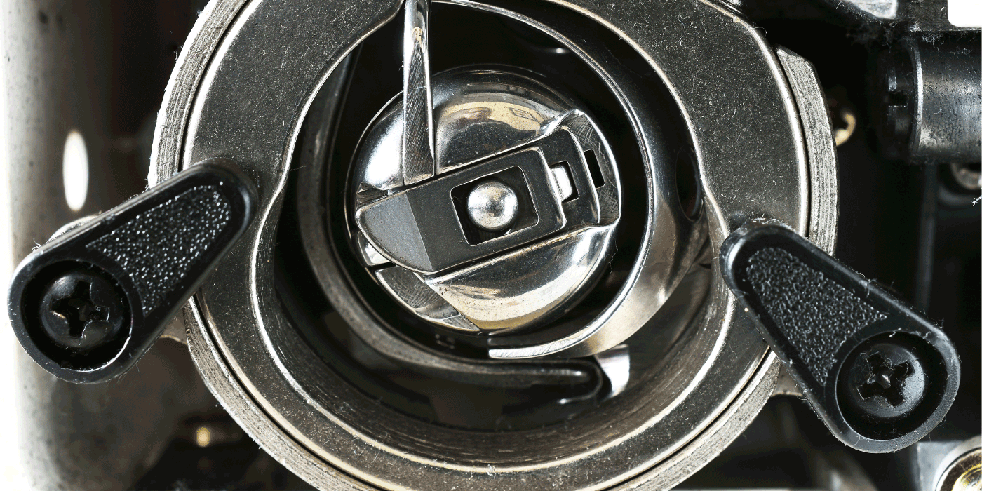 how to load a bobbin on a singer heavy duty sewing machine