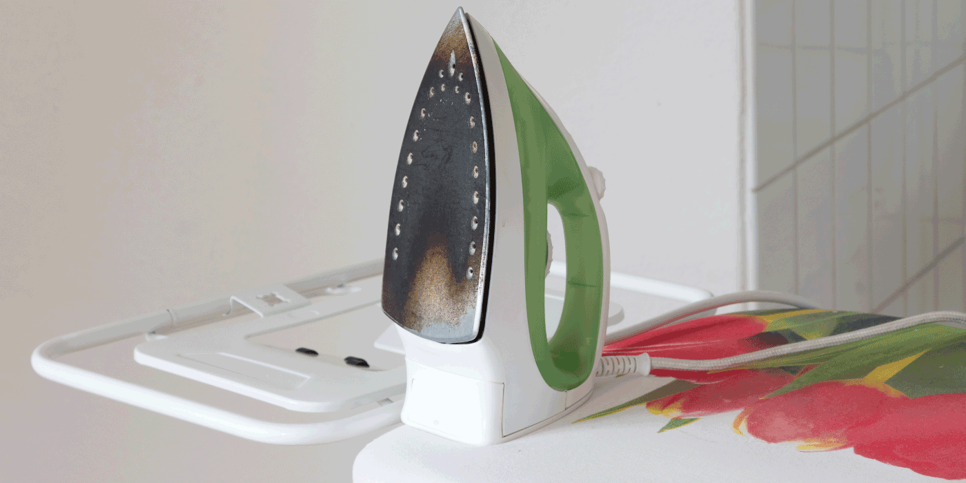 how do you attach an ironing board to the wall